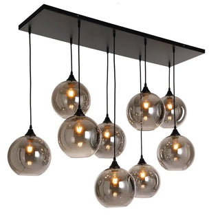 Stijlvolle eettafel hanglamp met glazen bollen in smoke uitvoering