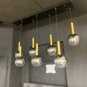Luxe hanglamp rookglas 7 bollen – voor boven eettafel – staven goud