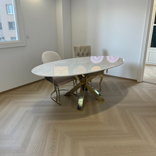 Travertin Eettafel ovaal Crème – Goud poten