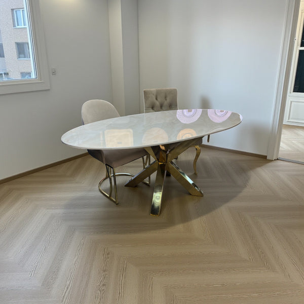 Travertin Eettafel ovaal Crème – Goud poten